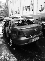 汽车明火被扑灭。 读者供图 - 新浪吉林