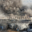 资料图：一建筑发生火情。解培华 摄 - 新浪吉林