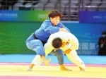 　　在柔道女子-78公斤级决赛中，吉林省选手马振昭（左）发挥出色，夺得吉林代表团在第十四届全运会首枚金牌。本报特派记者 张政 张宽 摄 - 新浪吉林